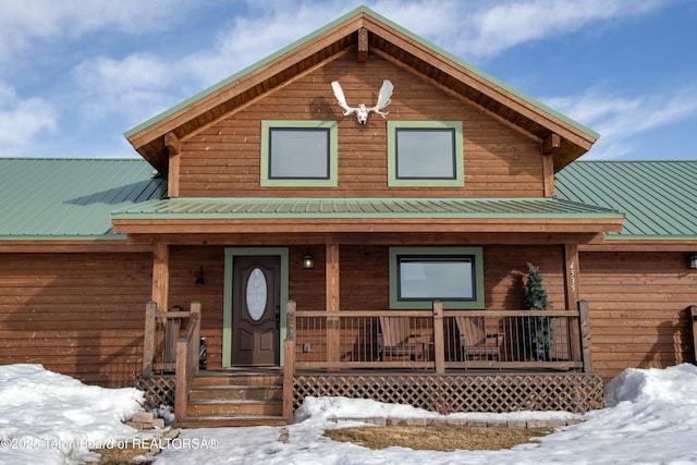 4535 Roxanne St, Tetonia, ID 83452 - chalet / cabin featuring covered porch and metal roof