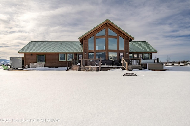 4535 Roxanne St, Tetonia, ID 83452 - snow covered property with a wooden deck