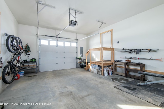 4535 Roxanne St, Tetonia, ID 83452 - garage featuring electric panel and a garage door opener