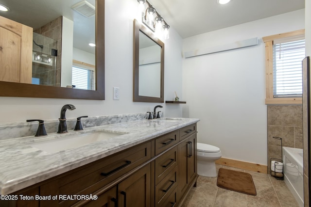 4535 Roxanne St, Tetonia, ID 83452 - full bath featuring double vanity, a tile shower, toilet, a bath, and recessed lighting