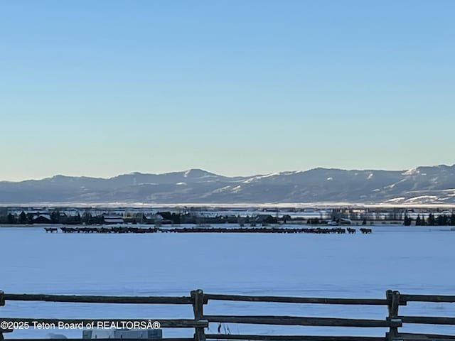 4535 Roxanne St, Tetonia, ID 83452 - water view with fence and a mountain backdrop