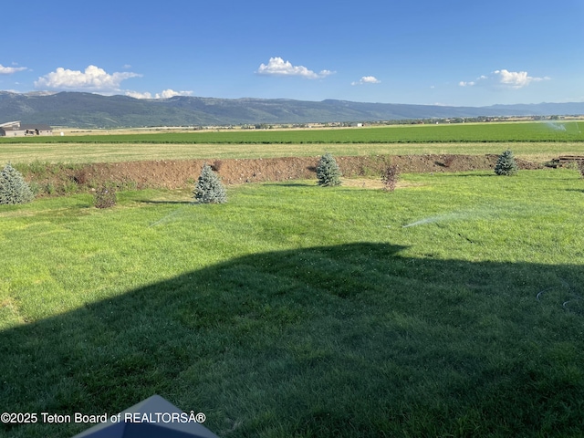 4535 Roxanne St, Tetonia, ID 83452 - view of green lawn featuring a rural view and a mountain view