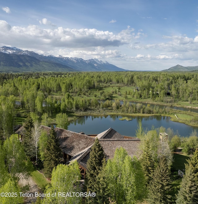 1525 S Thunder Rd, Wilson, WY 83014 - aerial view of property and surrounding area featuring a water and mountain view and a forest