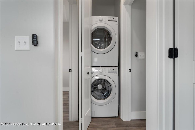 138 Larkspur Ave Unit 402, Victor, ID 83455 - laundry room with stacked washing machine and dryer and wood finished floors
