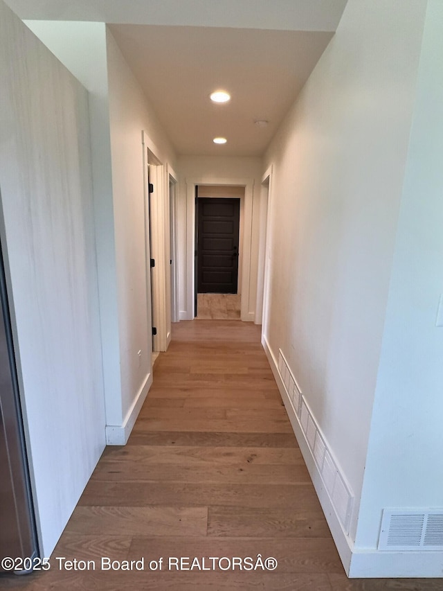 1714 River Meadows Dr, Victor, ID 83455 - corridor featuring recessed lighting and light wood-style floors