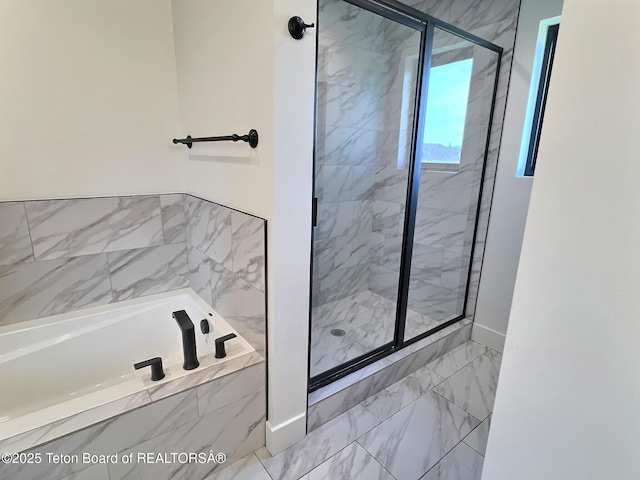 1714 River Meadows Dr, Victor, ID 83455 - bathroom featuring a bath and a marble finish shower
