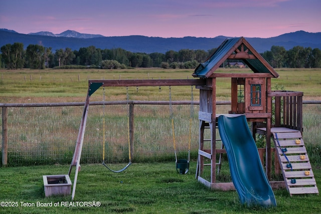 1714 River Meadows Dr, Victor, ID 83455 - view of jungle gym with a mountain view and a view of rural / pastoral area