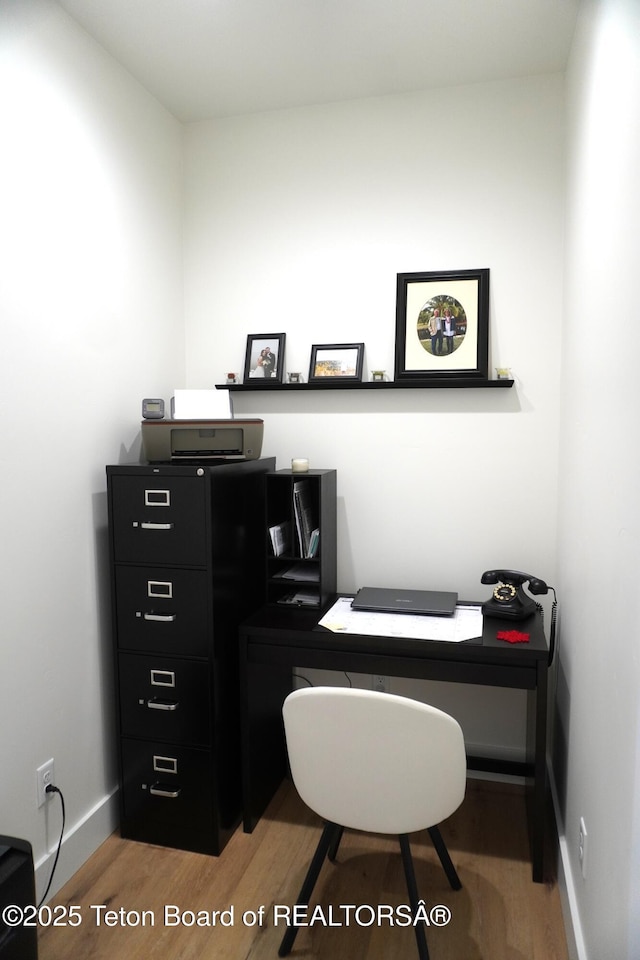 825 Mccoy Dr, Pinedale, WY 82941 - office space featuring baseboards and wood finished floors