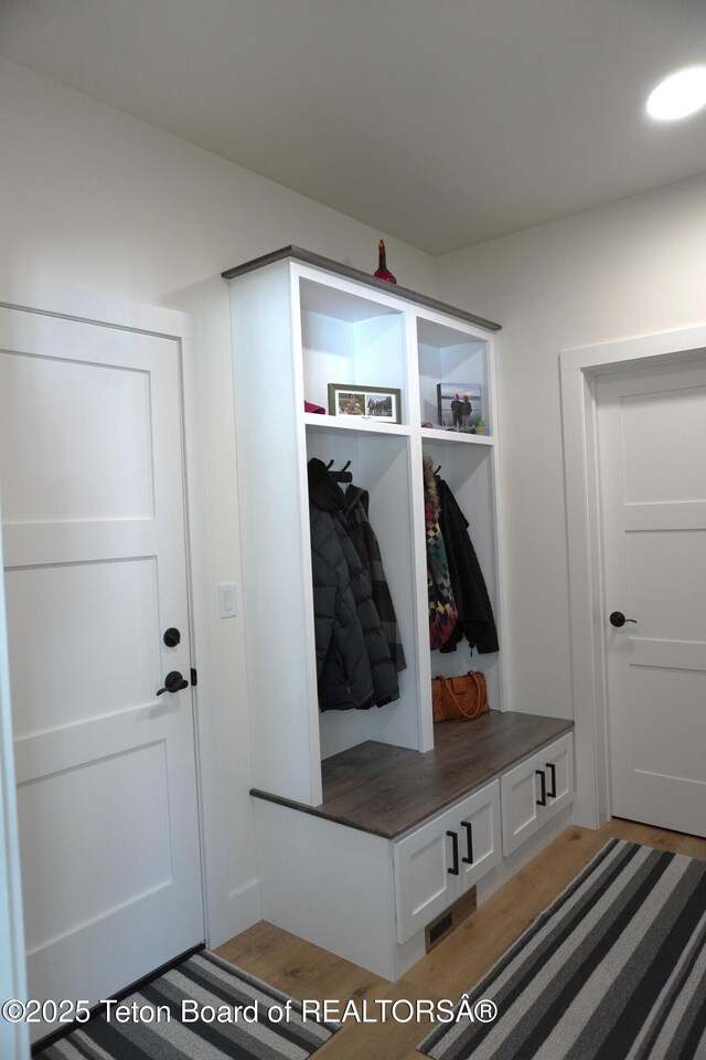 825 Mccoy Dr, Pinedale, WY 82941 - mudroom featuring wood finished floors
