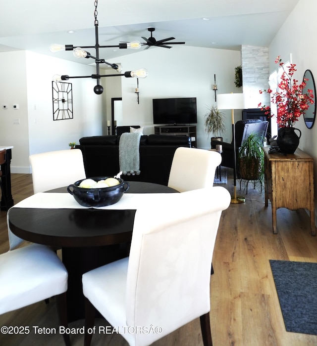 825 Mccoy Dr, Pinedale, WY 82941 - dining space with lofted ceiling and wood finished floors