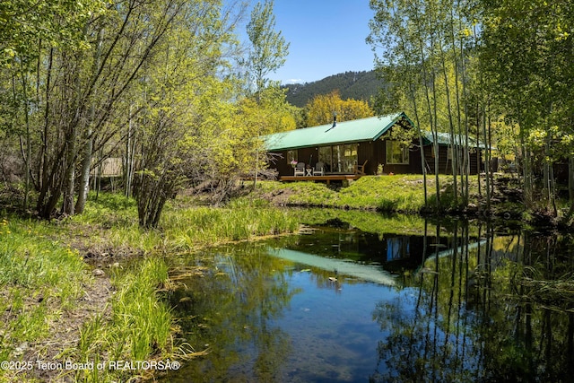 845 Cache Creek Dr, Jackson, WY 83001 - water view featuring a heavily wooded area