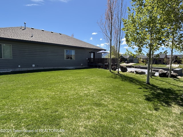 398 Palisade Trl, Driggs, ID 83422 - view of grassy yard featuring a deck