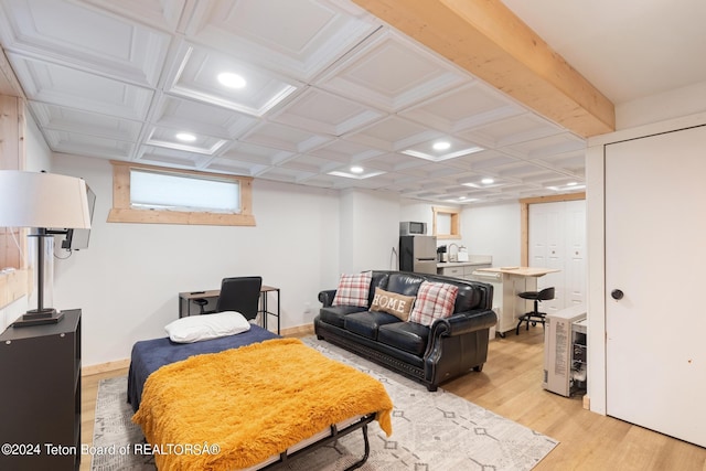 living area featuring coffered ceiling, recessed lighting, baseboards, beam ceiling, and light wood finished floors
