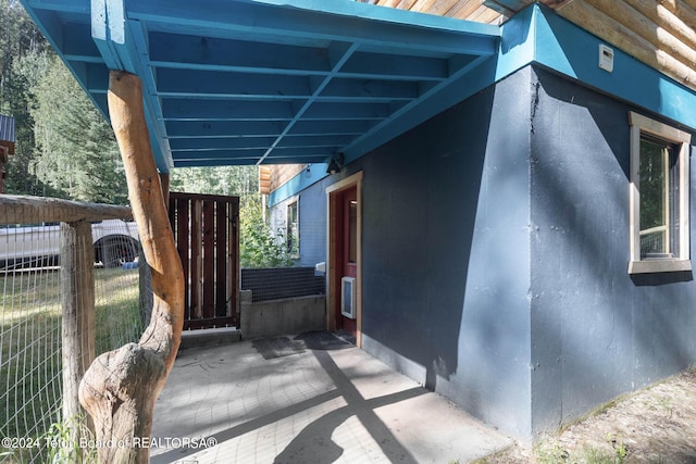 exterior space featuring a carport