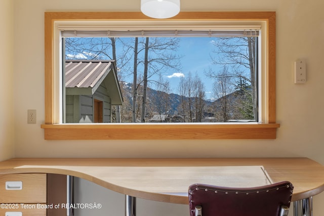 dining area with a mountain view