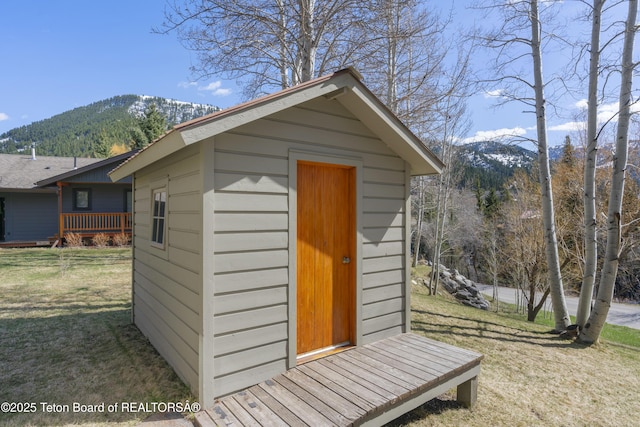 view of shed featuring a mountain view