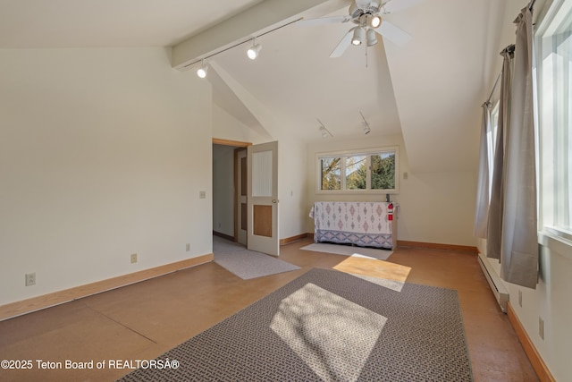 unfurnished living room featuring rail lighting, baseboards, and a baseboard heating unit