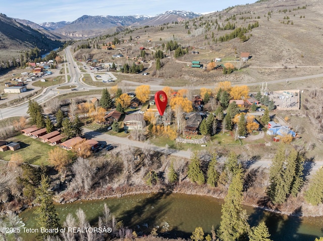 aerial view of property's location with mountains