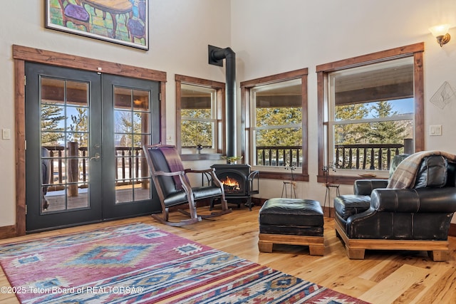 980 S 1000 E, Driggs, ID 83455 - interior space with a wood stove, french doors, and plenty of natural light