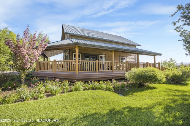 980 S 1000 E, Driggs, ID 83455 - rear view of property with a lawn, metal roof, and a wooden deck