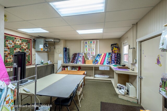 interior space with a drop ceiling