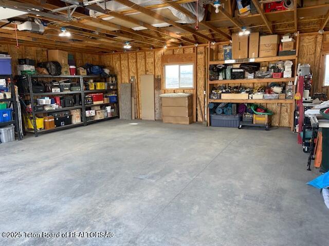 201 Sauk Trl, Pinedale, WY 82941 - garage featuring a workshop area