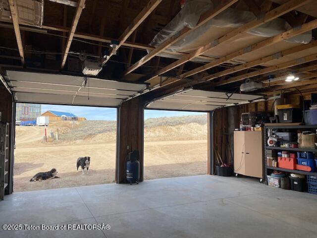 201 Sauk Trl, Pinedale, WY 82941 - garage with a garage door opener