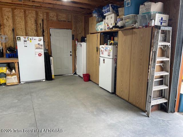201 Sauk Trl, Pinedale, WY 82941 - garage with freestanding refrigerator