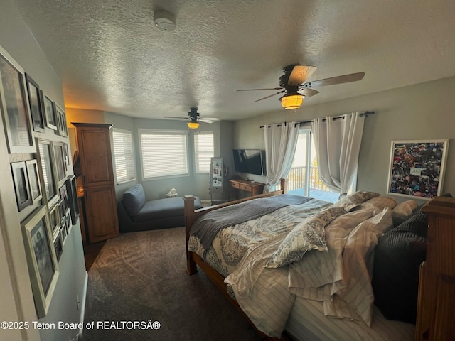 carpeted bedroom with access to exterior, a textured ceiling, and a ceiling fan