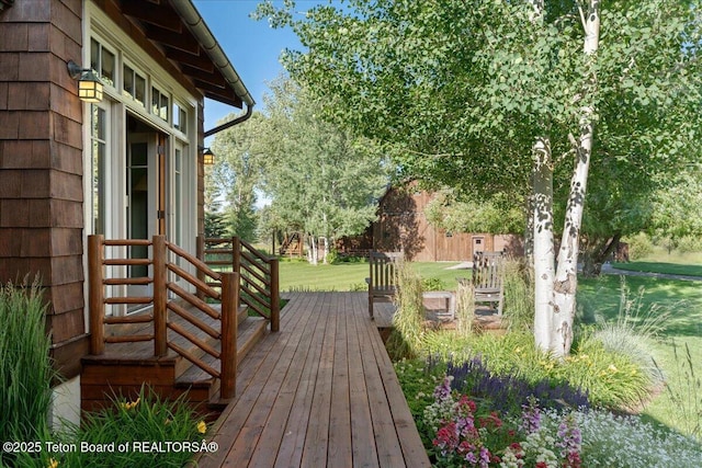 3300 N Trapper Ln, Wilson, WY 83014 - wooden deck featuring a yard