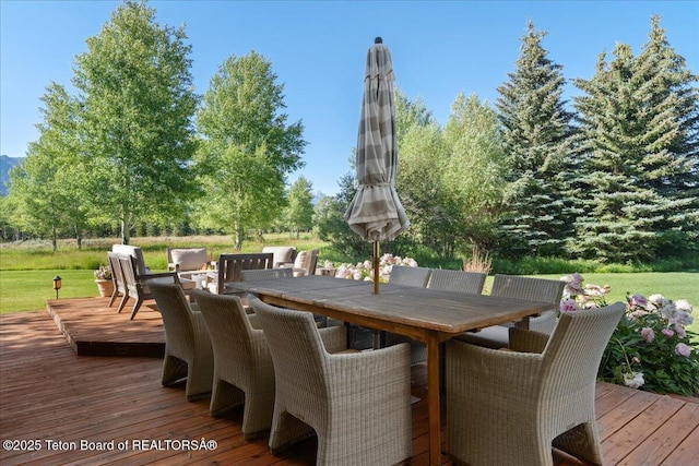 3300 N Trapper Ln, Wilson, WY 83014 - wooden deck with outdoor dining space