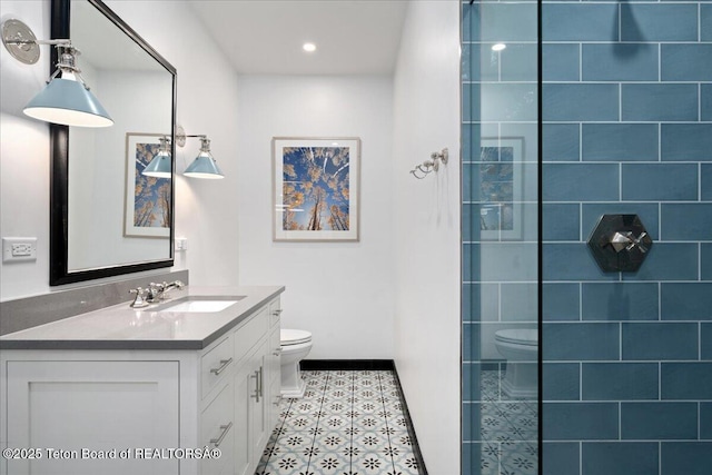 3300 N Trapper Ln, Wilson, WY 83014 - bathroom featuring vanity and tiled shower