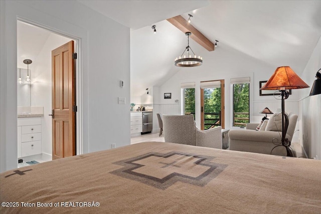 3300 N Trapper Ln, Wilson, WY 83014 - bedroom featuring a chandelier and ensuite bathroom