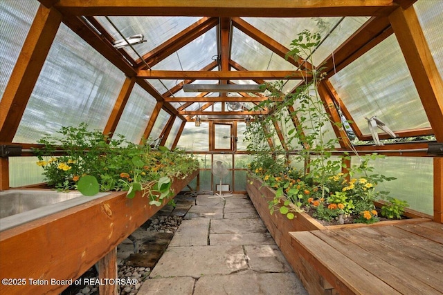 3300 N Trapper Ln, Wilson, WY 83014 - unfurnished sunroom featuring lofted ceiling