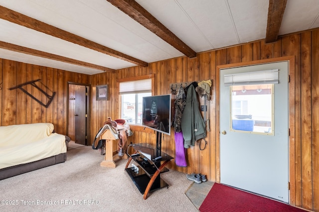44 12th St, Marbleton, WY 83113 - interior space with beam ceiling, carpet floors, and wood walls
