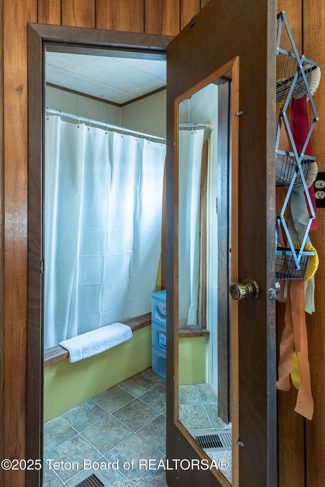 44 12th St, Marbleton, WY 83113 - bathroom featuring tile patterned floors and shower / bath combo with shower curtain