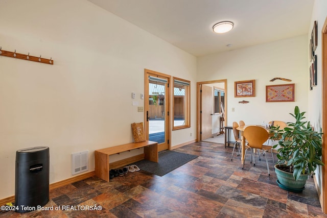 1820 Fall Line Dr, Driggs, ID 83422 - interior space featuring stone finish floor, visible vents, and baseboards