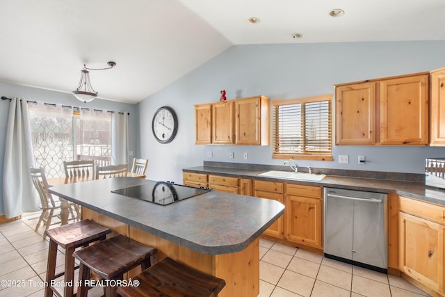 kitchen featuring dark countertops, black electric stovetop, a sink, dishwasher, and vaulted ceiling