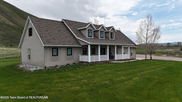 187 Foothill Dr, Afton, WY 83110 - view of front of house with covered porch and a shingled roof