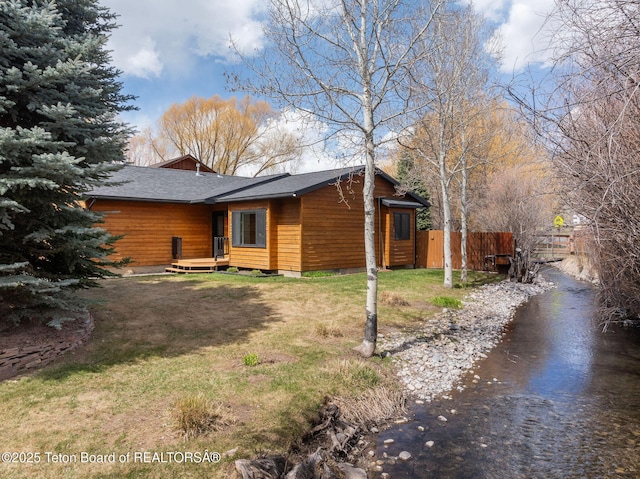 2032 Dandelion Ct, Jackson, WY 83001 - view of home's exterior featuring roof with shingles