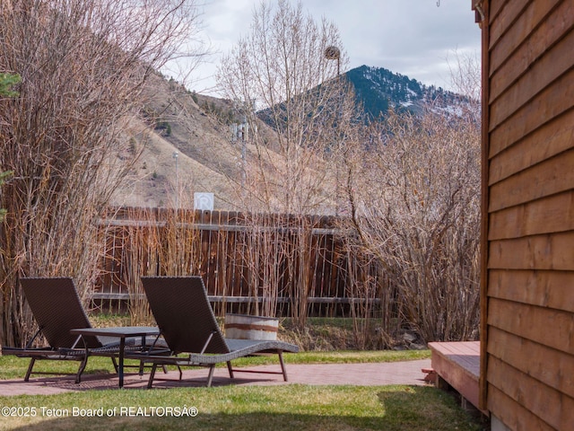 2032 Dandelion Ct, Jackson, WY 83001 - view of yard with fence and a mountain view