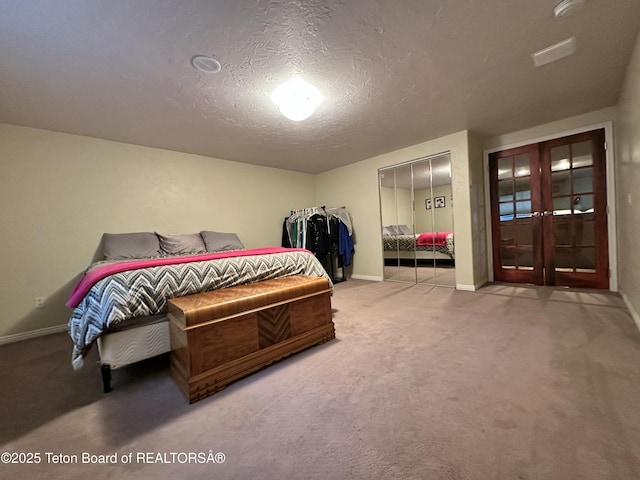 17 C B Ln, Pinedale, WY 82941 - carpeted bedroom featuring french doors, baseboards, and a textured ceiling