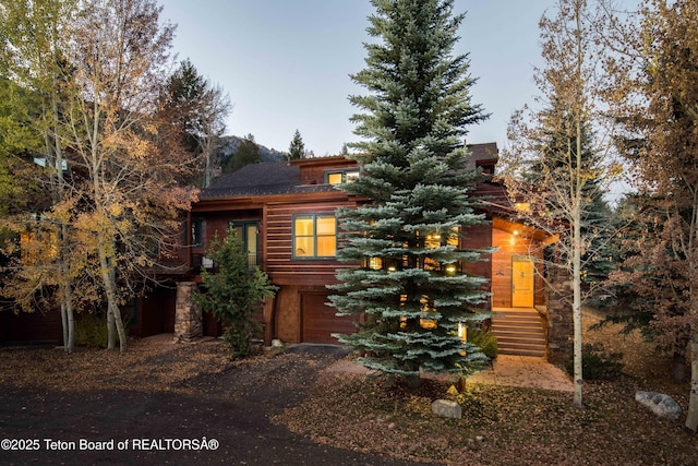 3723 W Michael Dr Unit 13, Teton Village, WY 83025 - exterior space featuring aphalt driveway and a garage