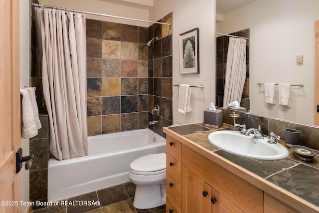 3723 W Michael Dr Unit 13, Teton Village, WY 83025 - bathroom featuring vanity, toilet, and shower / bath combo