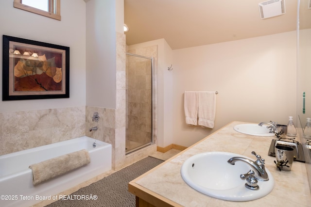 3723 W Michael Dr Unit 13, Teton Village, WY 83025 - full bath featuring a shower stall, a sink, visible vents, and double vanity
