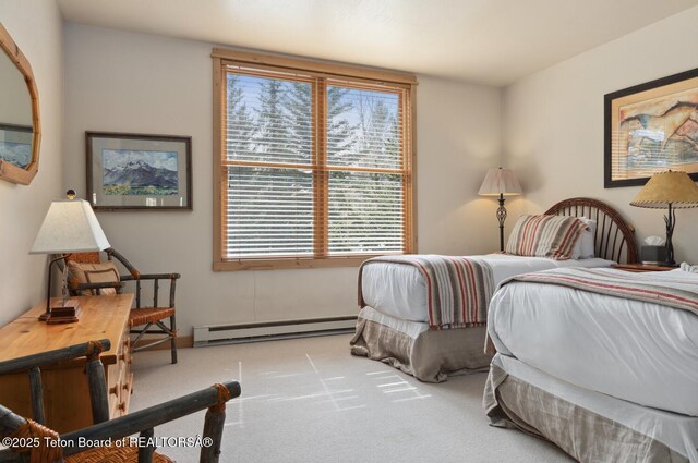 3723 W Michael Dr Unit 13, Teton Village, WY 83025 - bedroom with baseboard heating and carpet