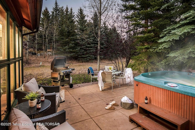 3723 W Michael Dr Unit 13, Teton Village, WY 83025 - view of patio with grilling area and a hot tub