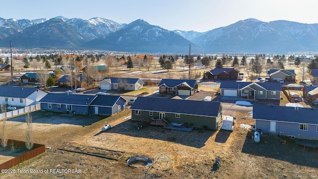 aerial view with a mountain view and a residential view