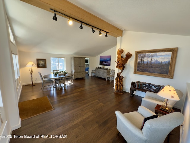 3048 Rangeview Dr, Jackson, WY 83001 - living room featuring vaulted ceiling with beams, wood finished floors, baseboards, and rail lighting
