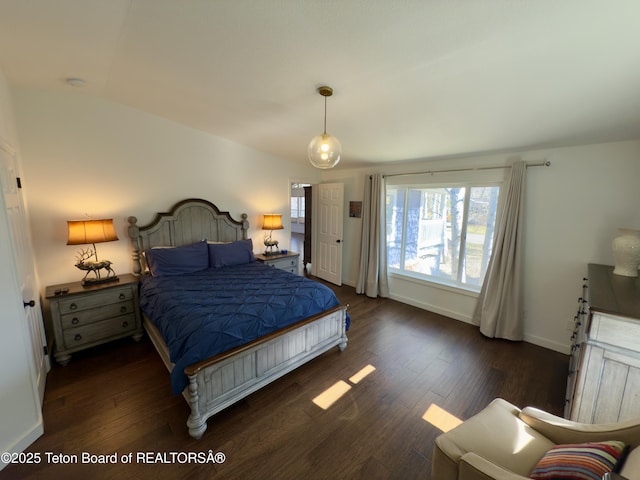 3048 Rangeview Dr, Jackson, WY 83001 - bedroom with wood finished floors, baseboards, and lofted ceiling